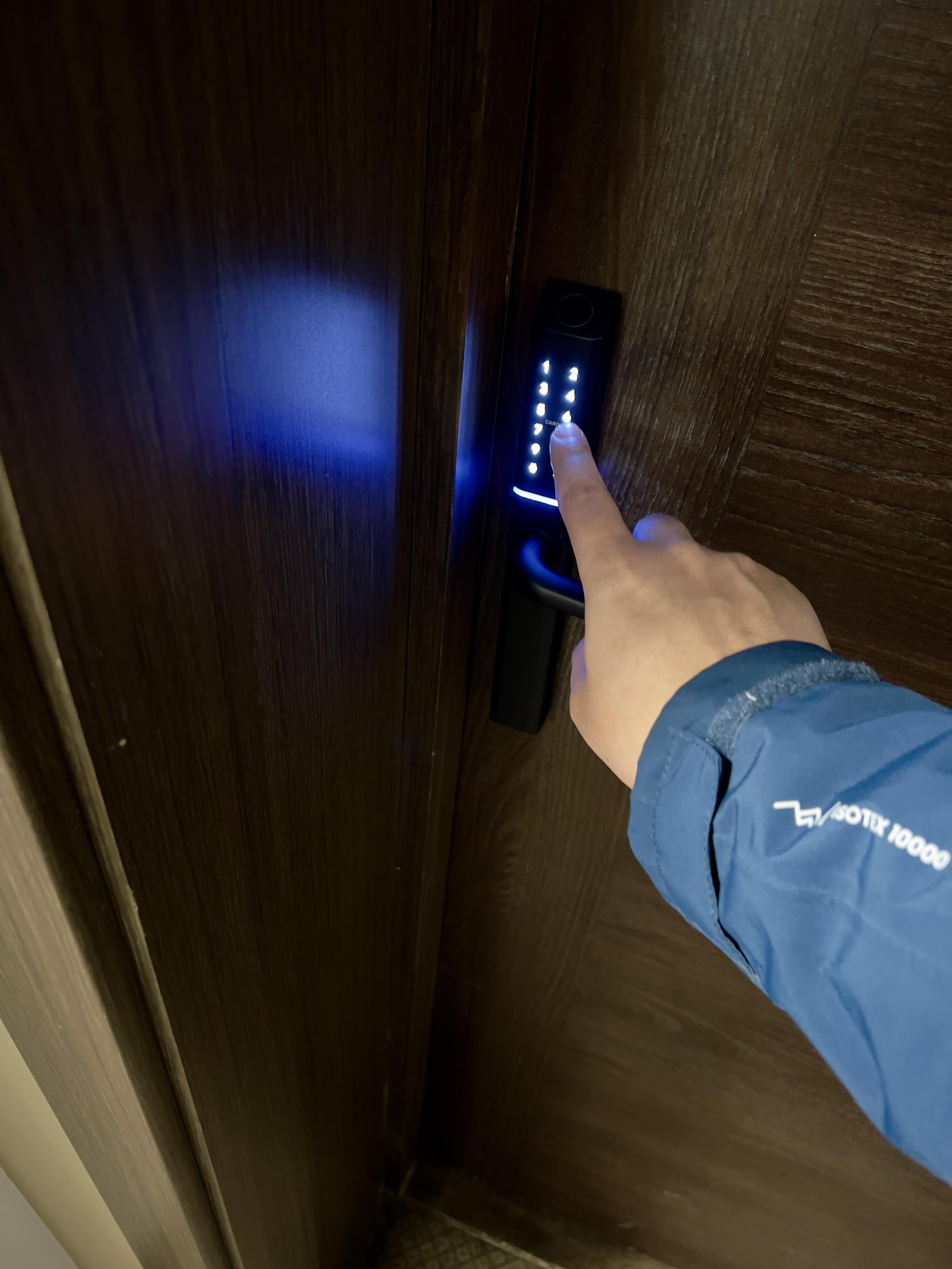 You can touch the White key fob to this part of the smart lock to unlock this door