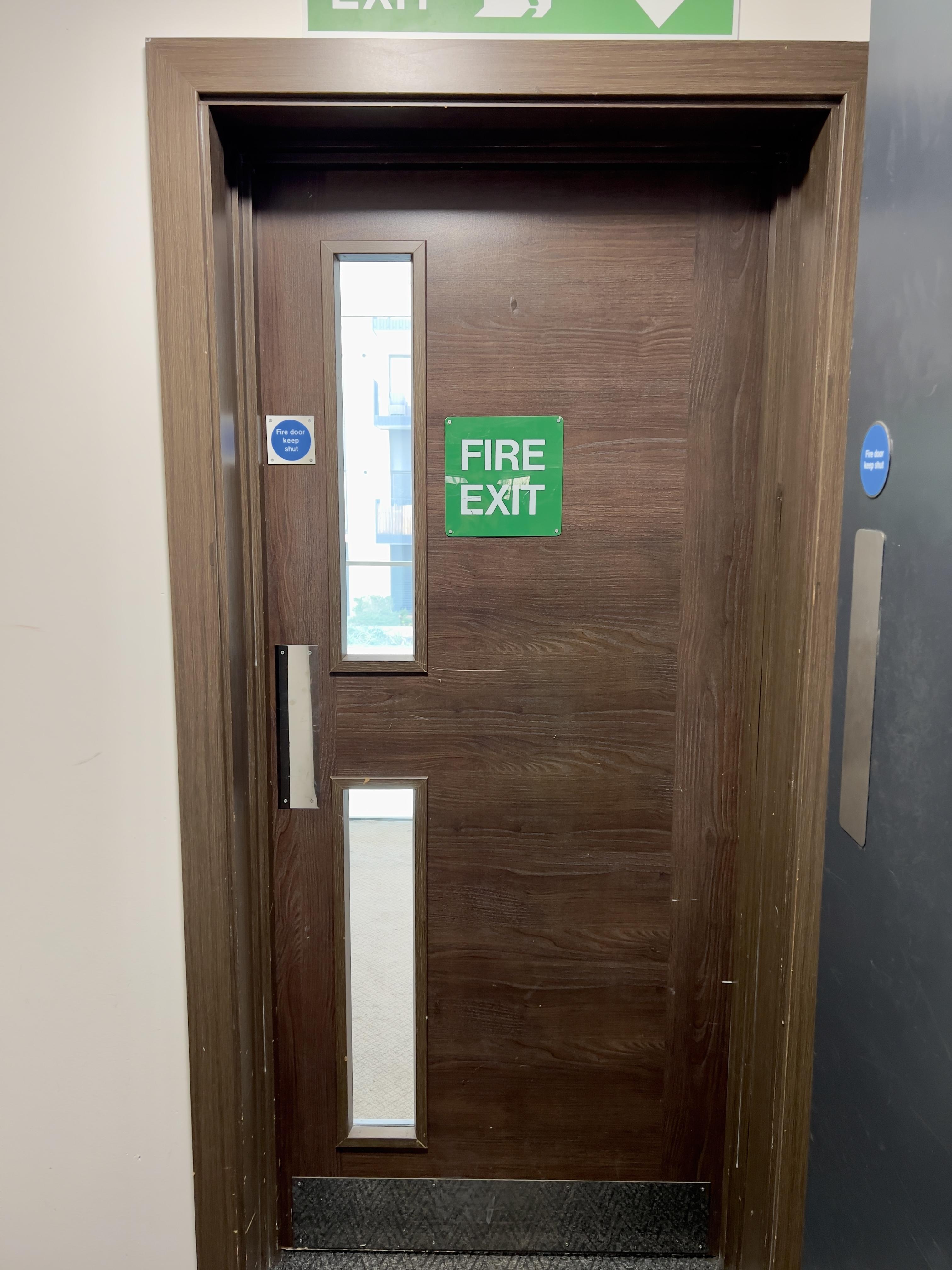 This door will take you to the First floor hallway. Then you can take the lift from here to the flat.