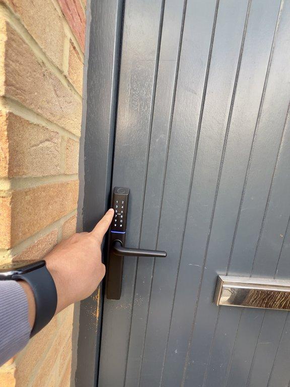 Now, enter your passcode on the smart lock's number pad and press the # button. The door will unlock.(Host messaged you the passcode)